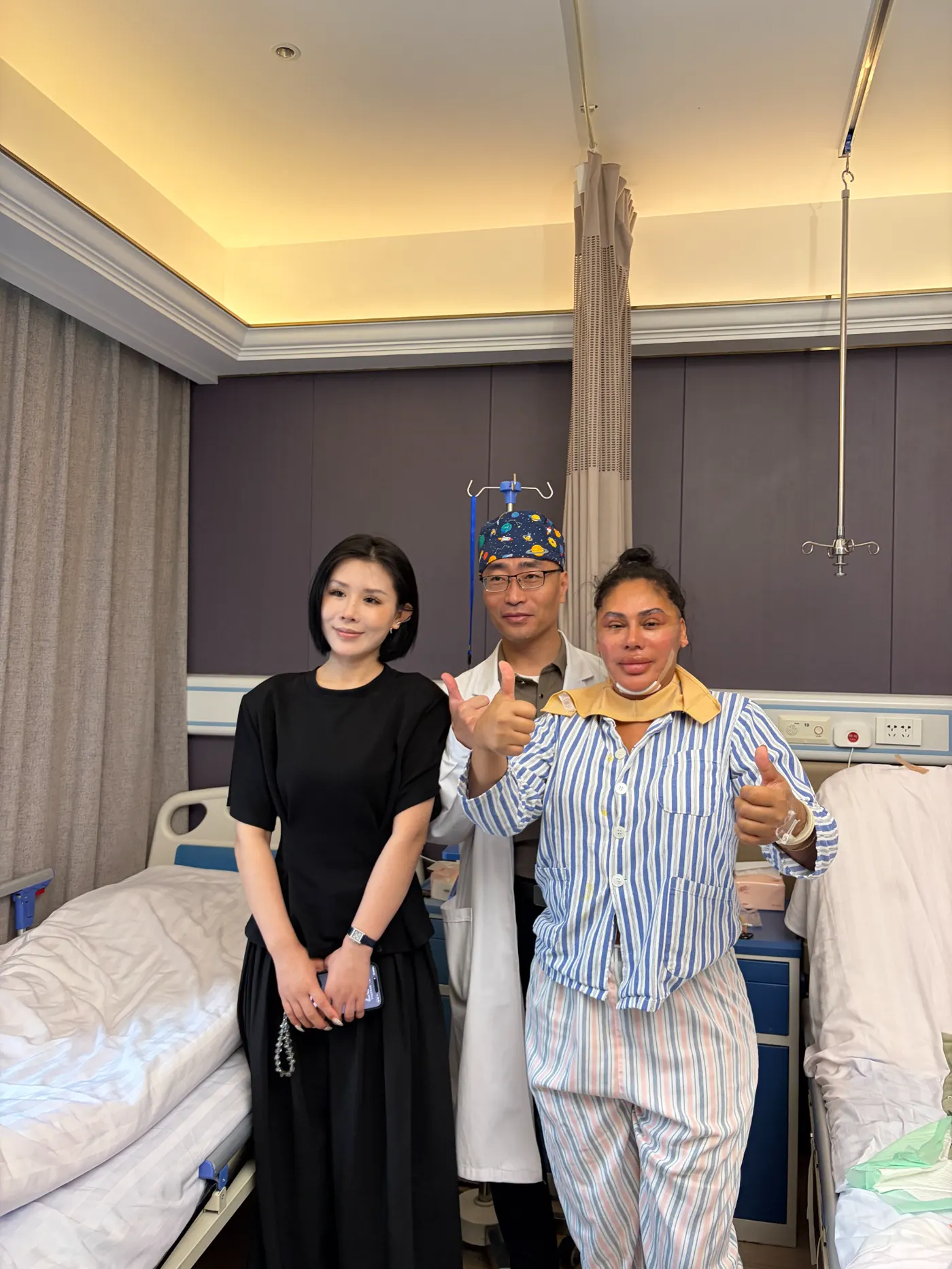 Postoperative visit with Dr. Xiao and the international support team